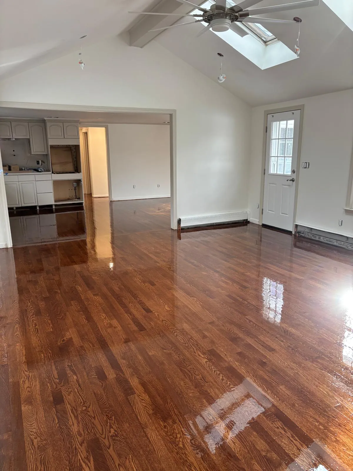 Freshly refinished hardwood floor in a Greater Boston home